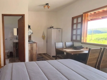 Quarto confortável com cama Queen size